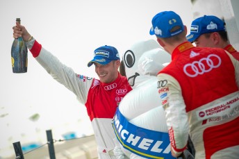 Edoardo Mortara celebrates victory in the Audi R8 LMS Cup 