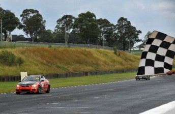 Chaz Mostert takes the chequered flag