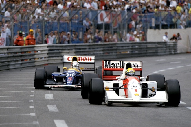 Senna leads Nigel Mansell in the MP4/7A at Monaco