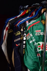 Plenty of race suits to go under the hammer 