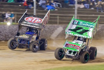 Peter Murphy (right) going wheel to wheel with Donny Schatz in NZ earlier this year