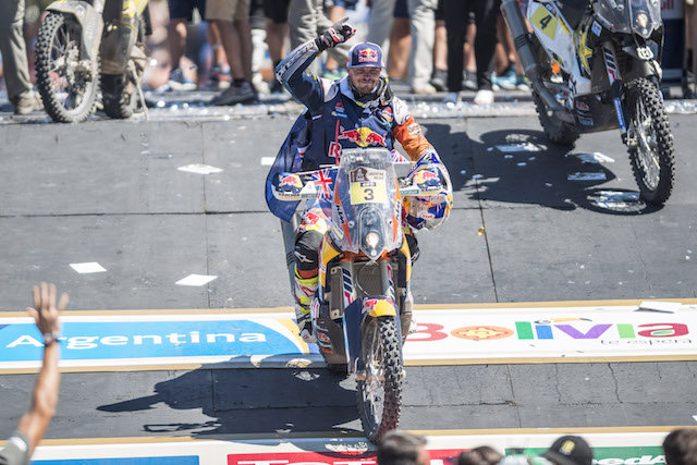 Toby Price rides his KTM factory bike to the Dakar podium in Rosario, Argentina.