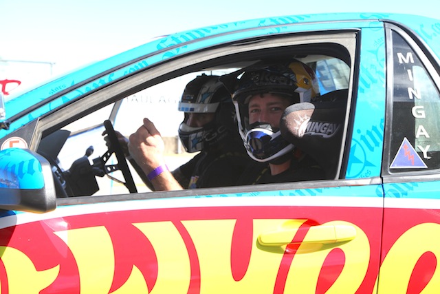 Travis Pastrana takes a ride with Matt Mingay in the Hot Wheels Ute at Queensland Raceway 