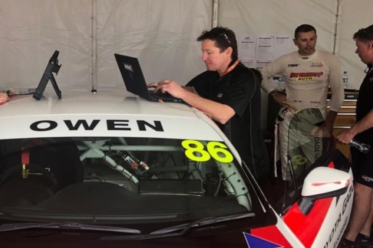 Phil Amour checking data from a Toyota 86 on his laptop from a recent race meeting.