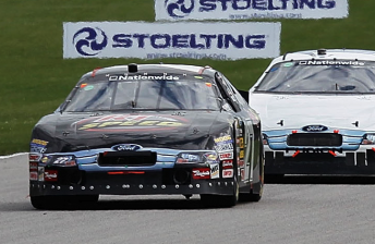 Owen Kelly leads the pack in the #27 Baker Curb Racing Ford Fusion at Road America