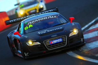 The #8 Team Joest Audi leads the way at the end of Hour 6
