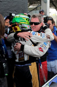 James Courtney and Steve Johnson embrace after Courtney wrapped up his V8 title in Sydney