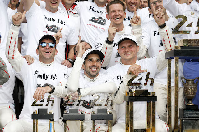 Drivers Romain Dumas, Neel Jani and Marc Lieb celebrate while Moore (top right) realises the gravity of the achievement