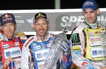 Jason Crump (left) stands tall with Nicki Pedersen (C) and Tomasz Gollob