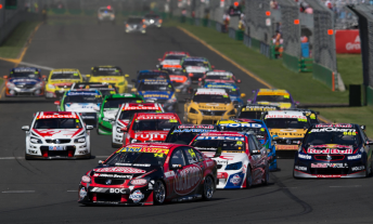 Coulthard leads the pack into Turn 1