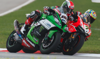 Jonathan Rea and Chaz Davies battle for the lead in Sepang