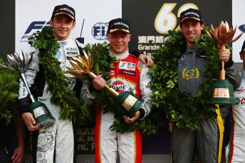 Felix Rosenqvist (centre) celebrates his second Macau GP triumph 