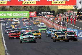The Touring Car Masters field blasts towards Hell Corner