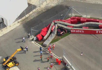 The aftermath of the crash involving Carlos Sainz