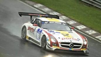 Bernd Schneider leading the Black-Falcon SLS to victory at the Nurburgring