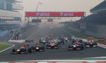 thumb Sebastian Vettel leads the field into Turn 1 in India