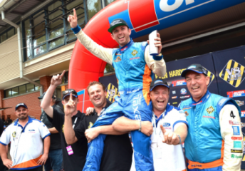 Ryal Harris celebrating with his Big Gun Racing team after winning the 2012 V8 Utes title