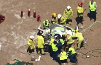 The horrific scene at Queensland Raceway. Pic: Channel 9