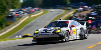 Earl Bamber on his way to a podium at Petit Le Mans