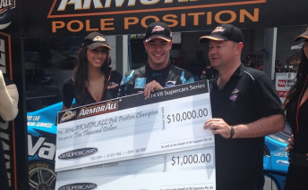McLaughlin receives the cheques from Armor All boss Paul Blair