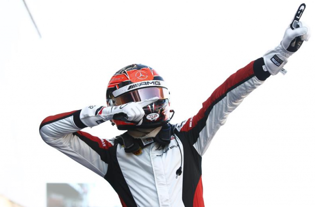 Esteban Ocon salutes victory in the GP3 opener at Barcelona 