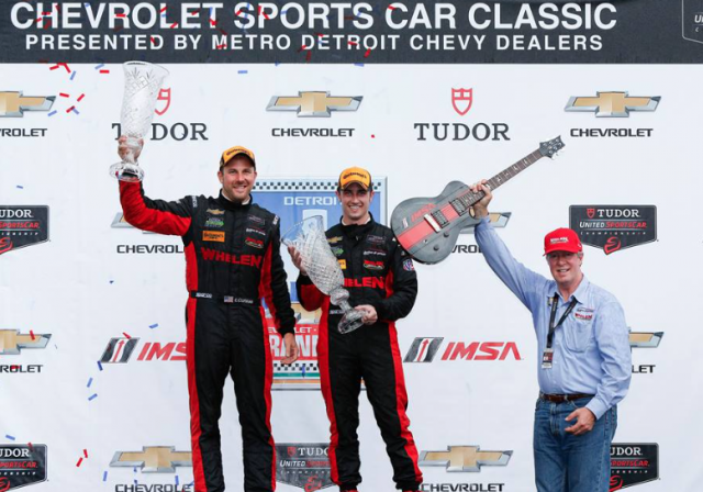 Dane Cameron and Eric Curran celebrate victory at Detroit