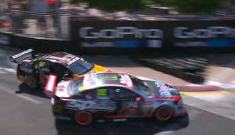The Holdens make contact at the apex. pic: V8TV