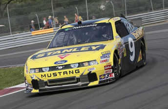 Marcos Ambrose has won his first NASCAR race at Montreal