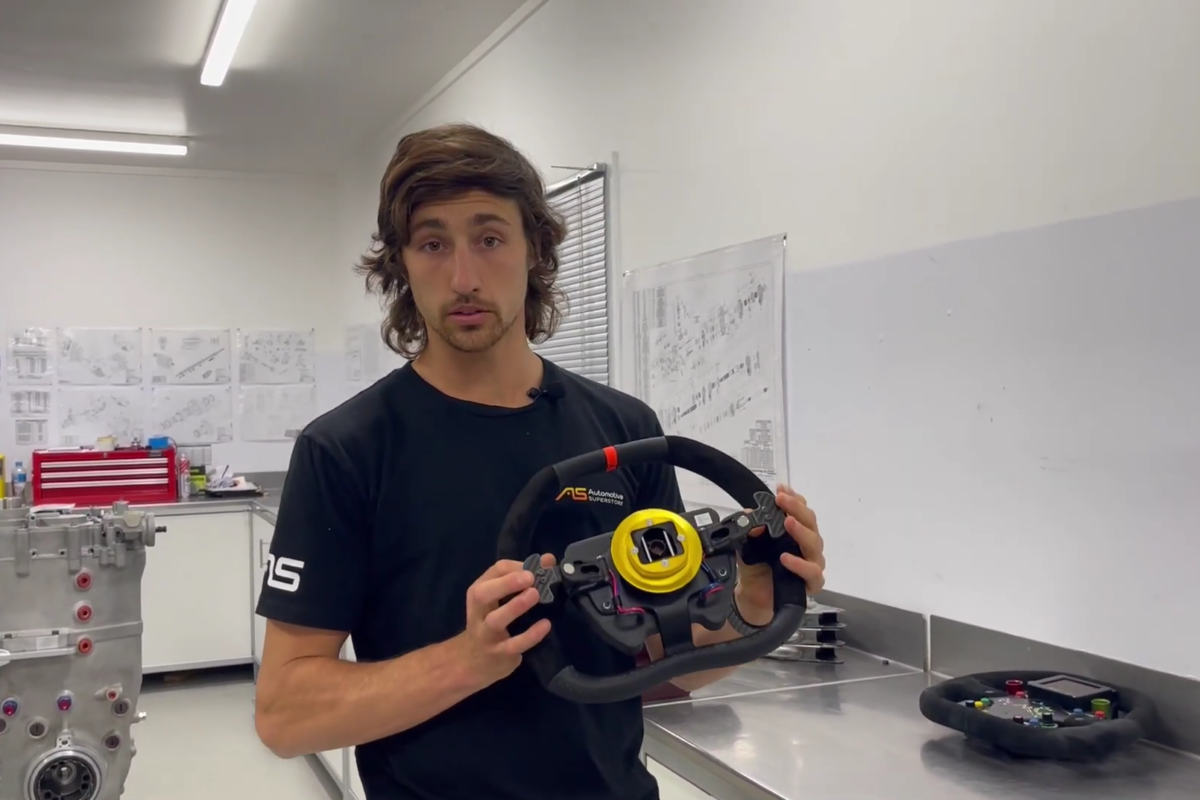 Macauley Jones shows off the paddles on the Gen3 steering wheel