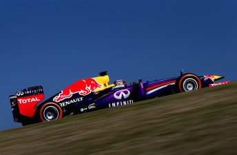 Sebastian Vettel produces scorching lap to claim pole 
