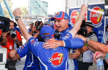 Tim Slade celebrates pole with the Lucky 7 Racing crew