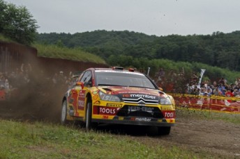 Petter Solberg holds a narrow lead in Japan