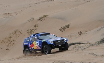 Carlos Sainz took his fifth stage win of the 2011 Dakar