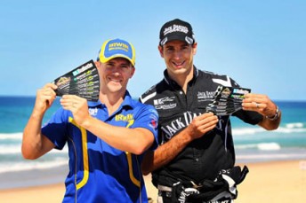 Lee Holdsworth and Rick Kelly with the Gold Coast Bulletin/Speedcafe.com bumper stickers