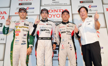 Joao Paulo de Oliveira (center) celebrates Super Formula victory 