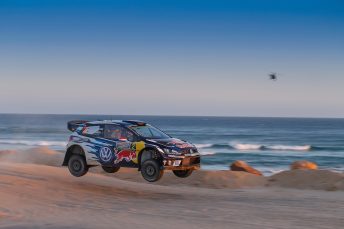 Jari-Matti Latvala launches over the beachside jump 