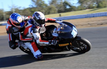 Troy Bayliss takes Michael Patrizi for some hot laps around Queensland Raceway