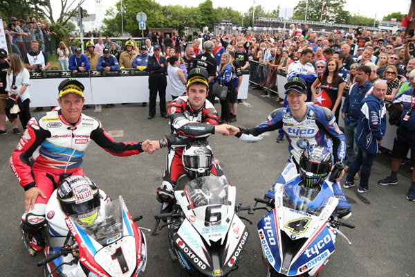 Michael Dunlop flanked by Ian Hutchinson (right) and John McGuinness 