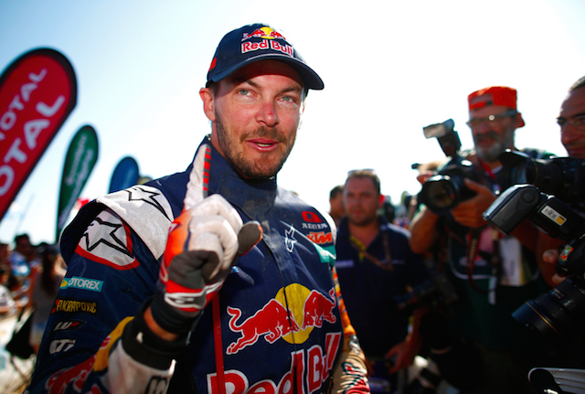 A jubilant Toby Price faces the media at the finish of the Dakar following his history-making win