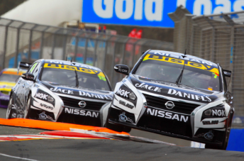 Todd Kelly leads team-mate and brother Rick through the beachside chicane