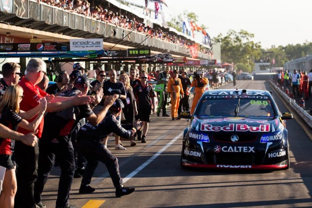 The pitlane applauds Craig Lowndes after his 100th career win