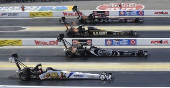 Incredibly close fight in Top Fuel was won by Spencer Massey (top lane)