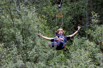 Coulthard flying through the Hollybank Treetops Adventure in Tasmania 