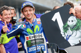 Valentino Rossi celebrates pole position for the Spanish Grand Prix