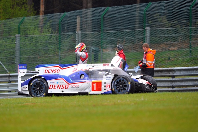 Audi driver Oliver Jarvis stands beside the Toyota of Kazuki Nakajima after the Japanese driver ploughed into the back of the R18 e-tron quattro. pic: PSP Images