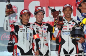The Yoshimura Suzuki riders on the podium