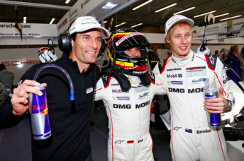 Timo Bernhard, wearing a helmet paying tribute o Stefan Bellof, flanked by Mark Webber and Brendon Hartley