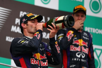 Vettel pauses for thought as Webber turns to the bottle