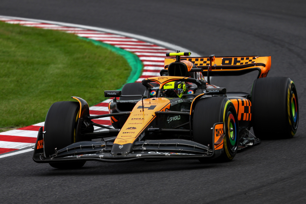 Lando Norris was left 'swearing in his helmet' as he lost time behind Sergio Perez in Japan. Image: XPB Images