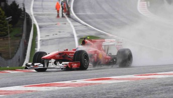 Fernando Alonso fought through the spray to be the fastest at Spa